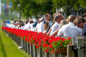 Racegoers at the heart of the action at the Trackside Pavilions during the Moet and Chandon July Festival c Newmarket Racecourses